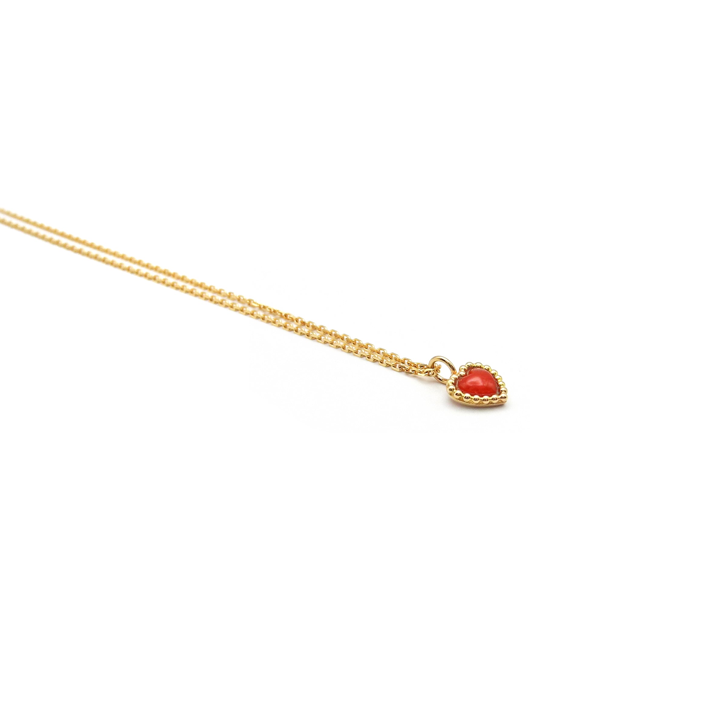 Goldkette mit Korallenherz