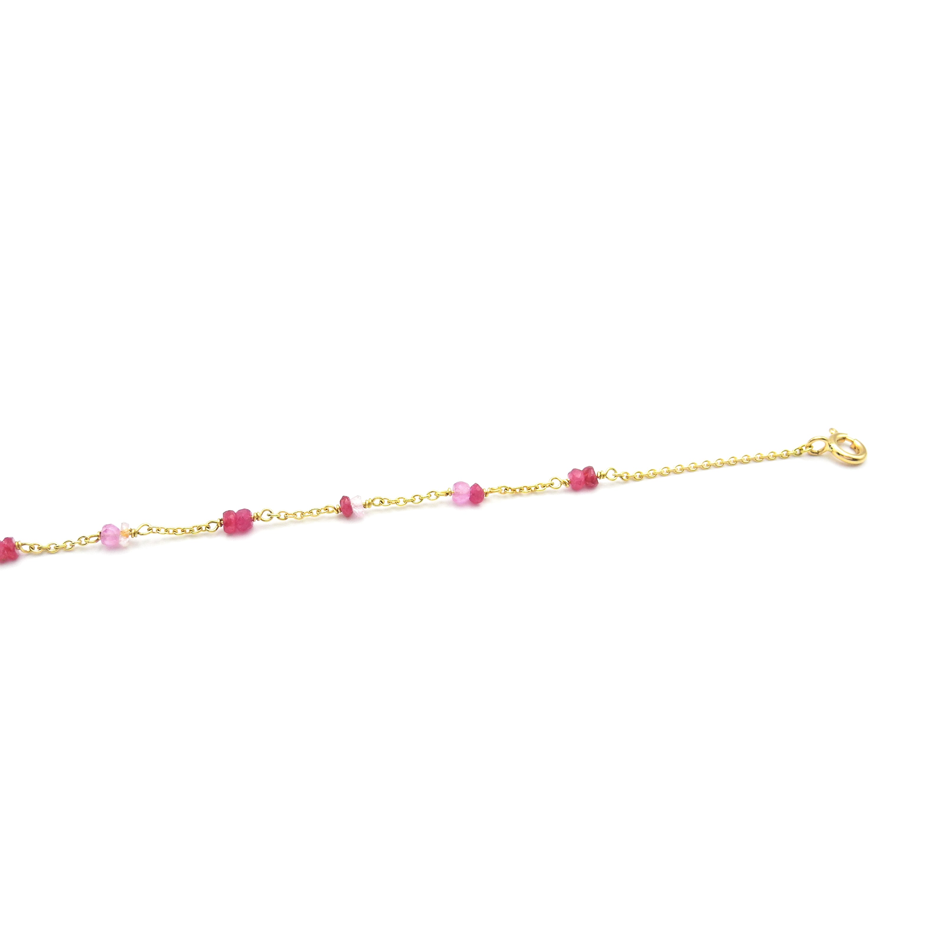 Goldarmband mit rot-rosa Saphiren