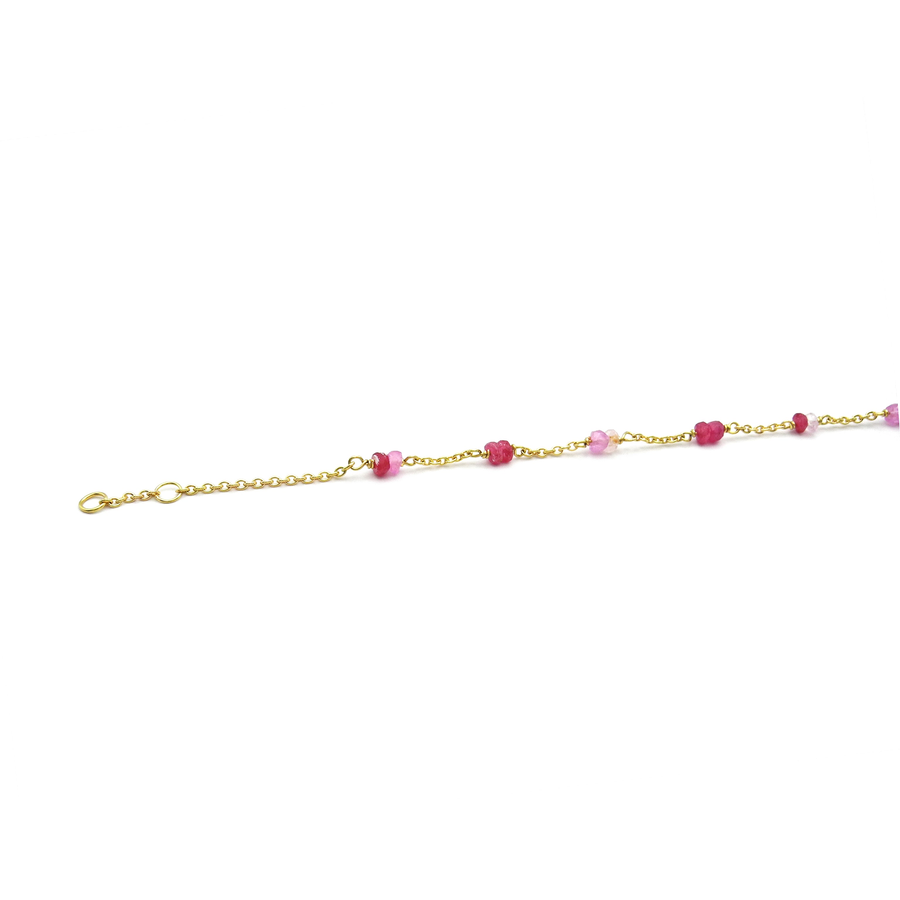 Goldarmband mit rot-rosa Saphiren